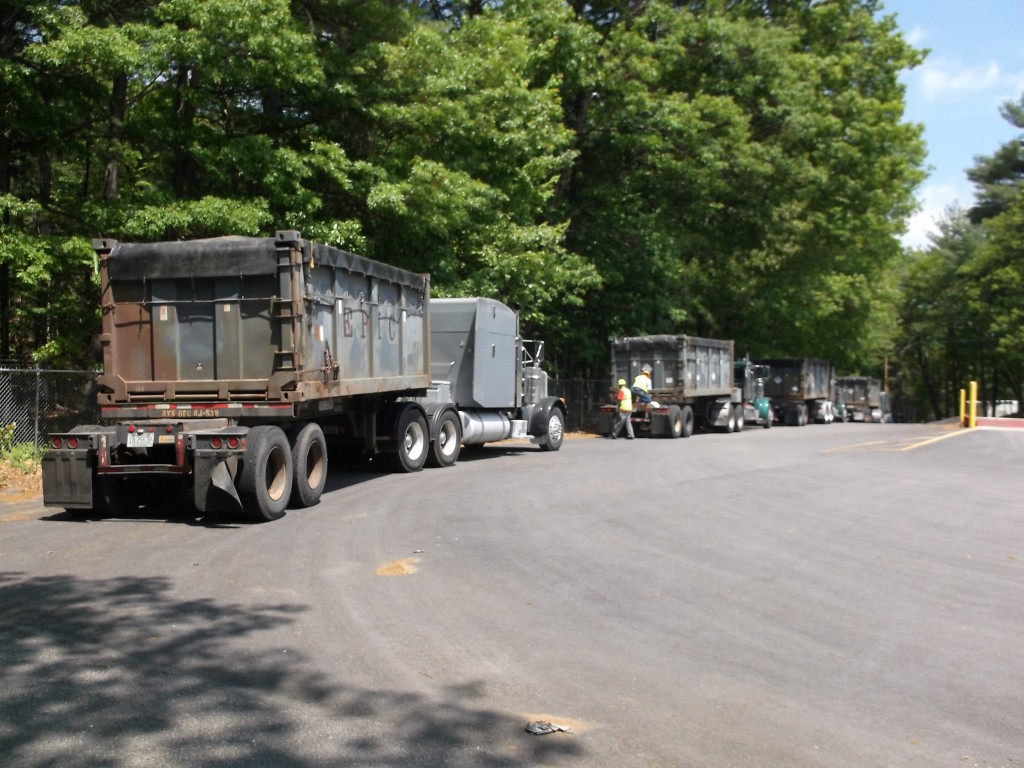 Four trucks loaded and ready to leave NMI site, 28 MAY 2015.